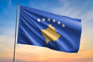 Flag,Of,Kosovo,Waving,Flag,On,Sunset,View